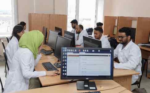 Indian students in computer lab at Altai State Medical University Russia.