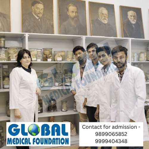Four Indian student with their teacher in a science lab at Northern State Medical University.